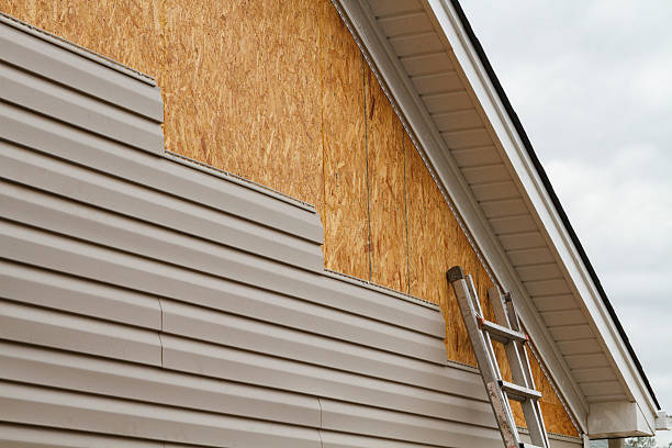 Professional Siding Contractor technician working in Cedarville, OH